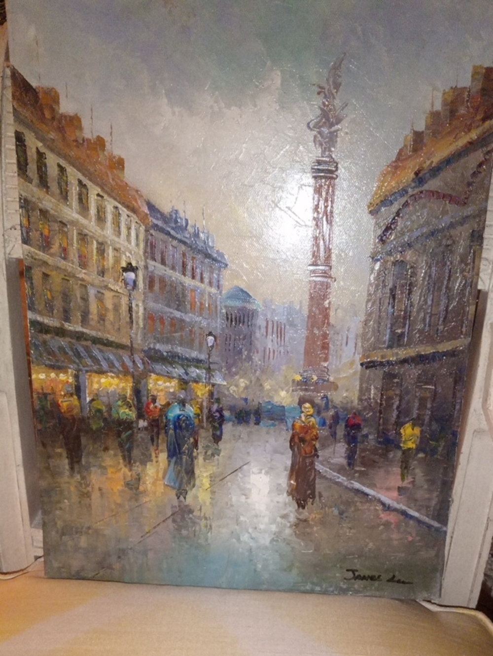 Gorgeous hand-painted oil on canvas depicting a romantic, rainy Paris street sce